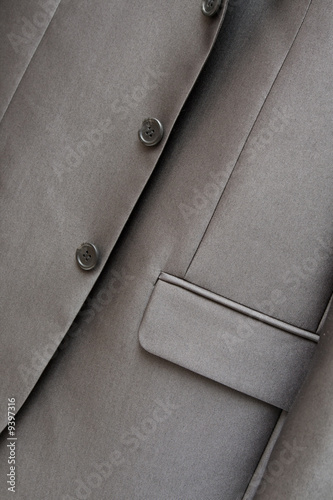 fragment of gray men's suit, close-up