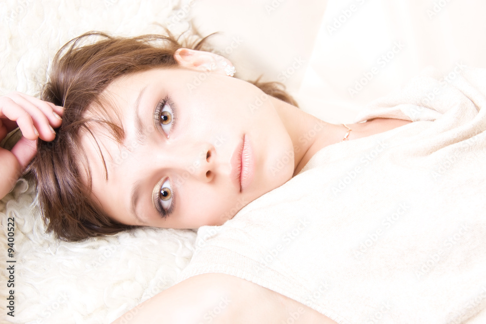 Resting woman portrait. Bright lighting without shadows. Resting woman portrait. Bright lighting without shadows.