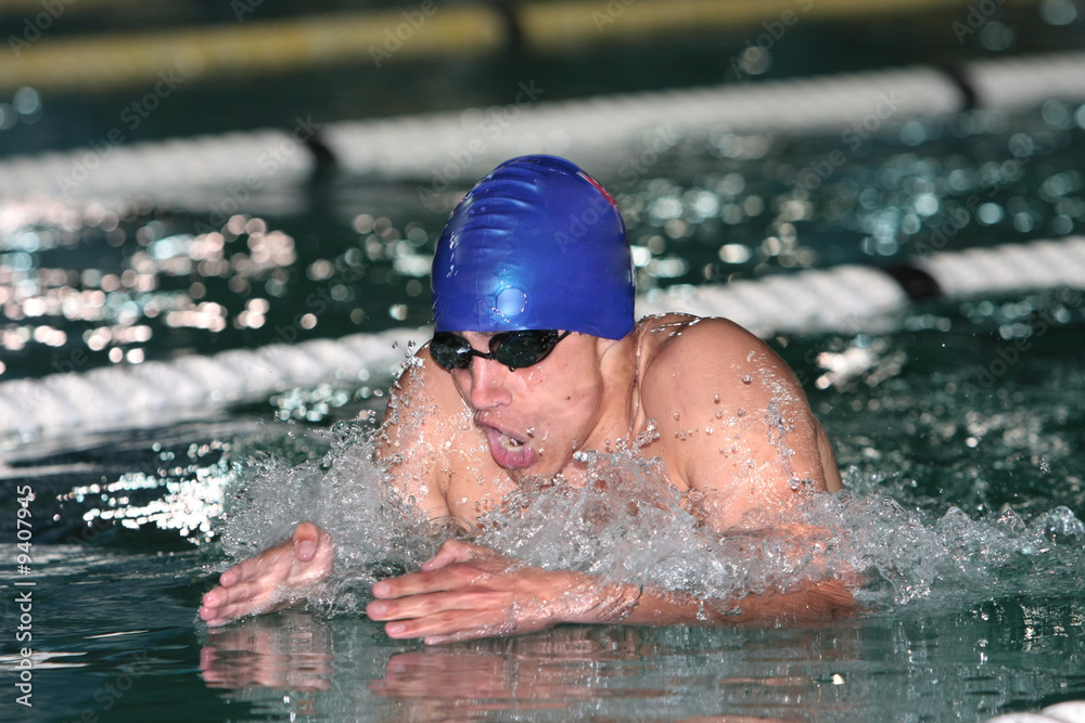 Action photo of breaststroke swimmer