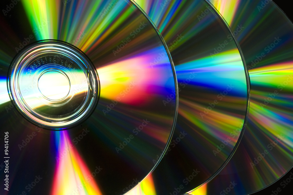 Compact discs raw reflecting ray of color Compact discs raw reflecting ray of color