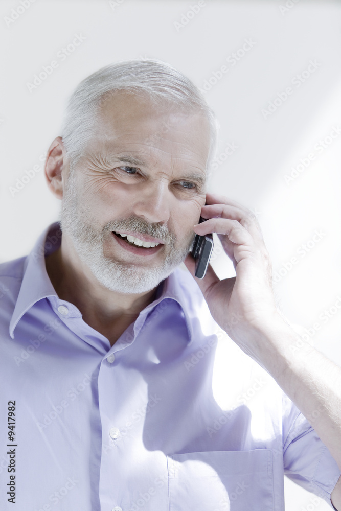 phoning handsome expressive senior phoning handsome expressive senior