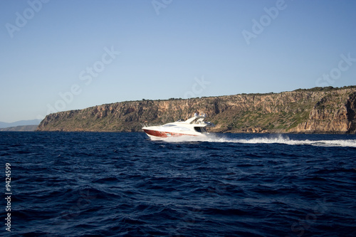 The motorboat drives fast on the sea. © AH Images