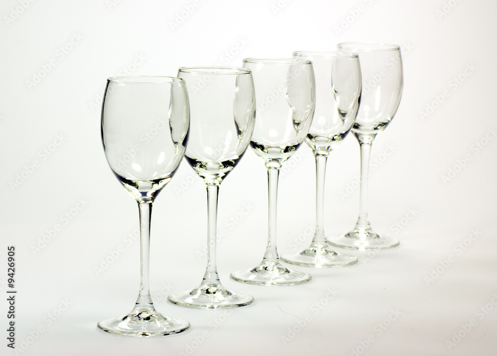 Empty cognac glasses set isolated on white background B&W Empty cognac glasses set isolated on white background B&W