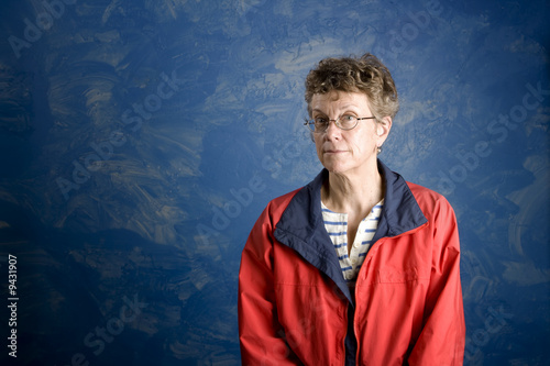 Portrait of a senior woman in her sailing clothes photo