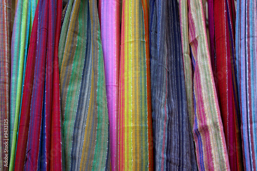 Background of colorful scarfs in a crafts market