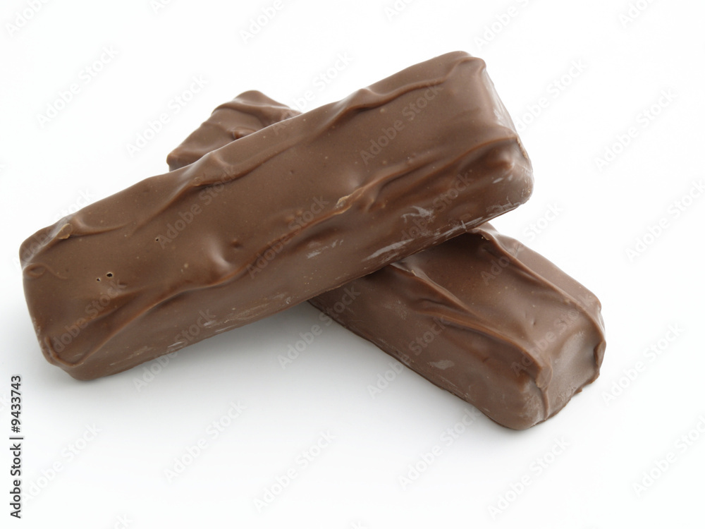 chocolate candy bar with peanuts isolated on white background chocolate candy bar with peanuts isolated on white background