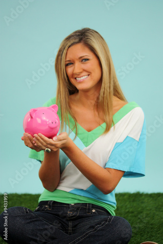 Woman Sitting In Grass With...