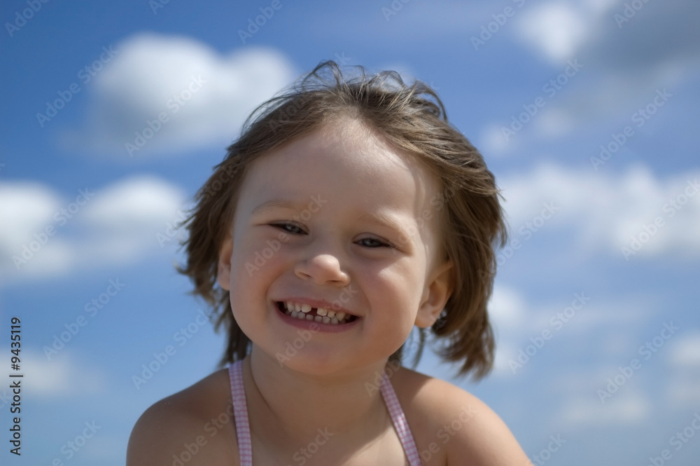 sweet little girl on the beach. summertime