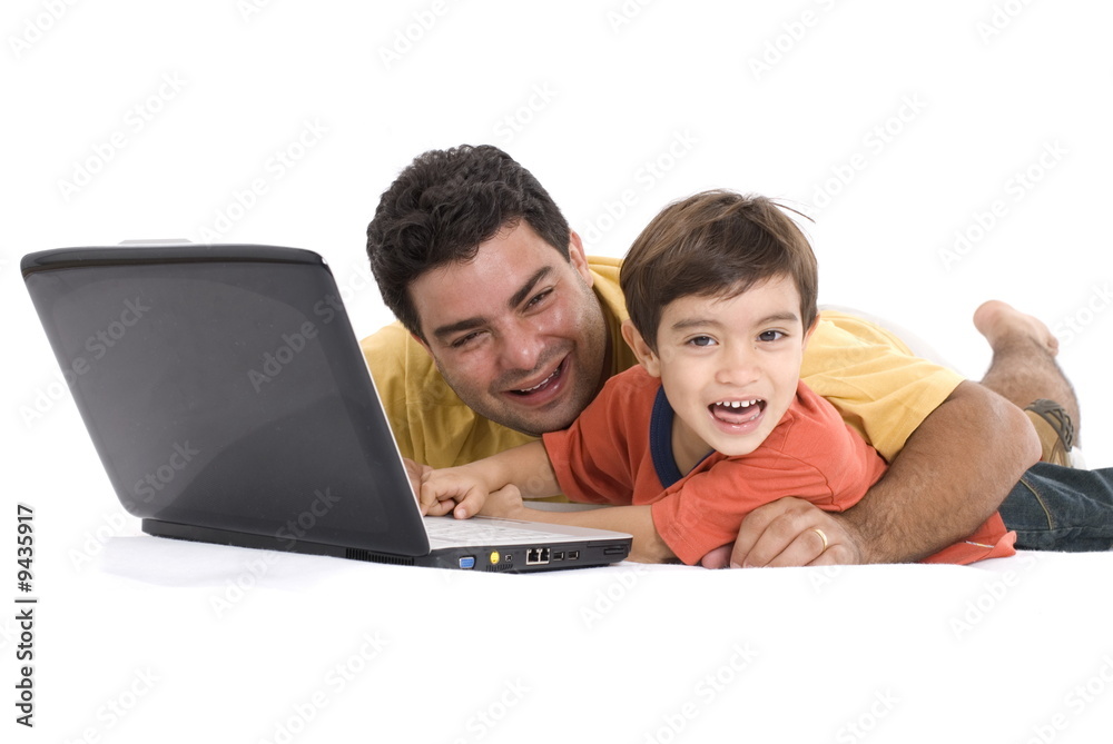 Parents having fun using the Laptop .
