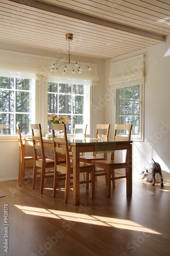 Interior of a home, dining room and dog