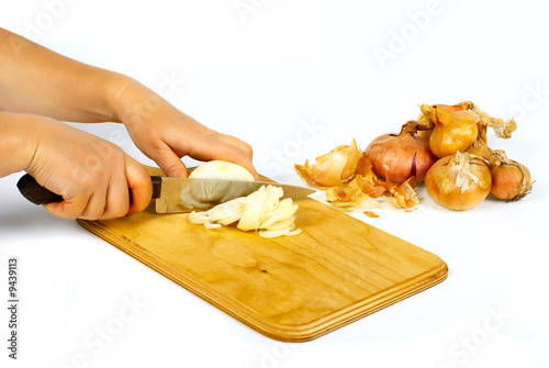 Cooking onions on cutting boards with stainless knife