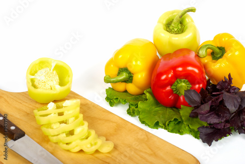 Cooking peppers on cutting boards with stainless knife
