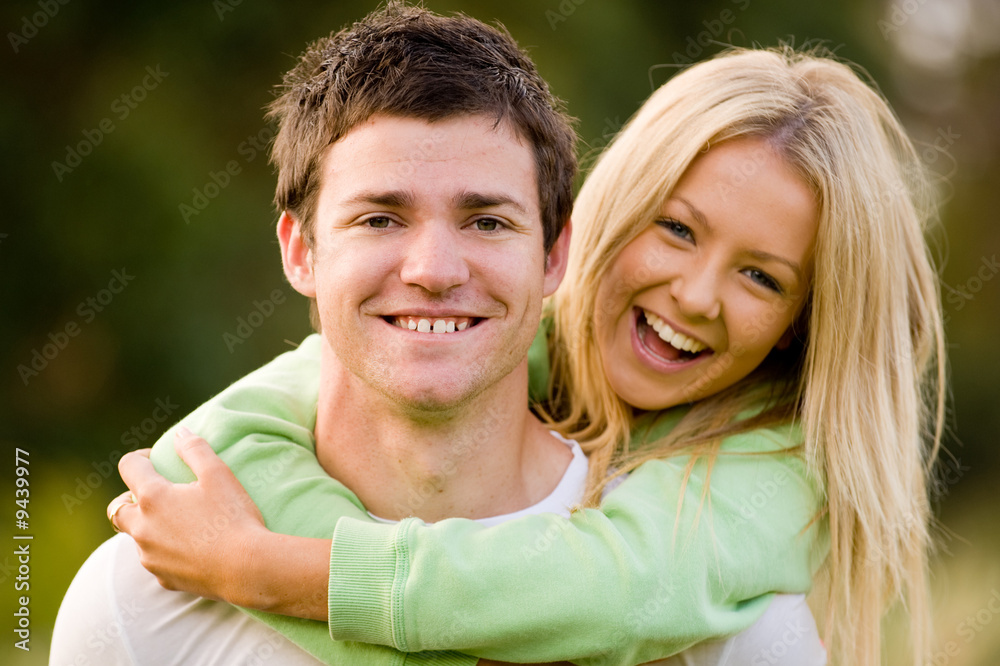 A young couple outside in the countryside A young couple outside in the countryside