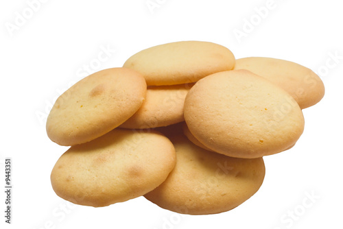 heap of simple biscuits on white