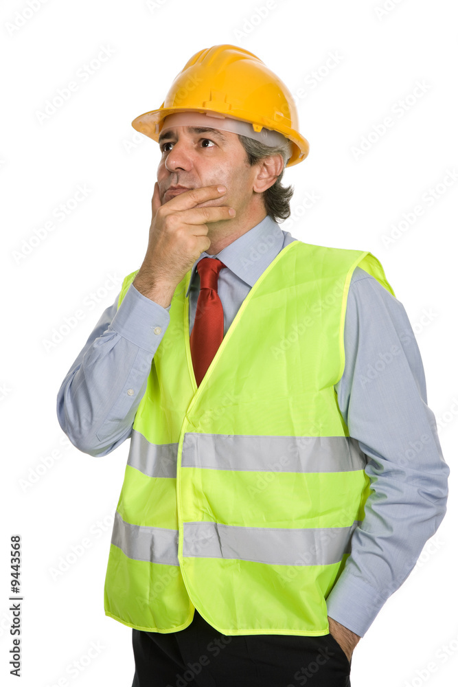 An engineer with yellow hat, isolated on white An engineer with yellow hat, isolated on white