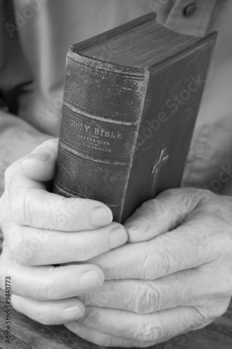Older Man Holding Bible