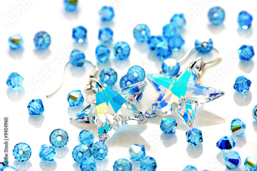 Transparent star shape swarovski puts together with beads.
