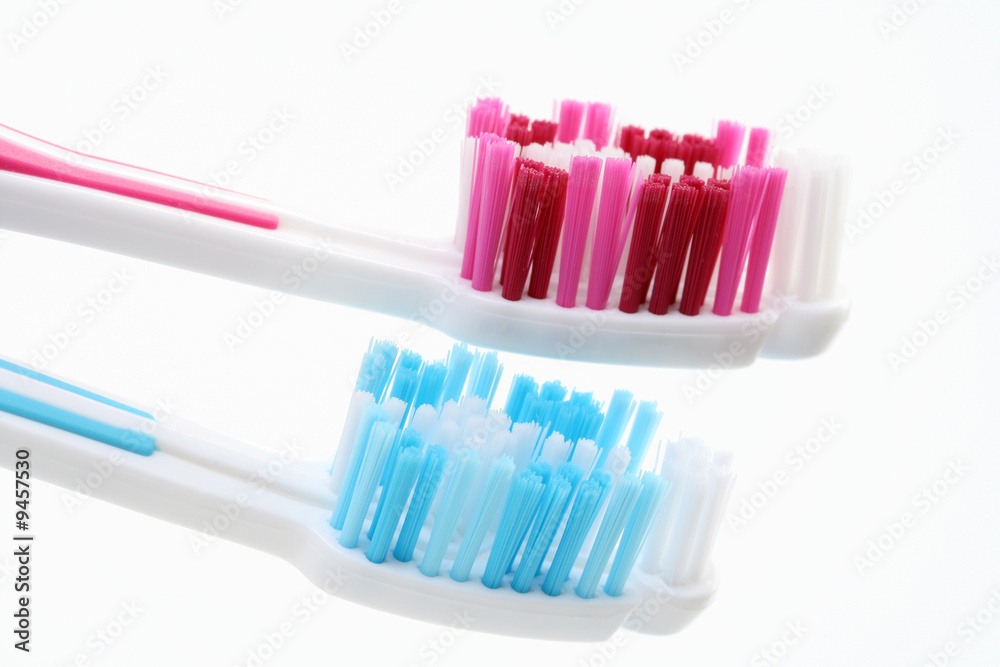 two toothbrushes isolated on white background two toothbrushes isolated on white background