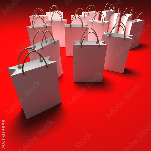 White paper shopping bags against a red background