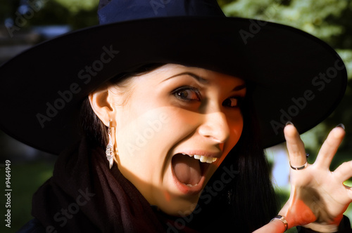 Screaming witch in hat photo