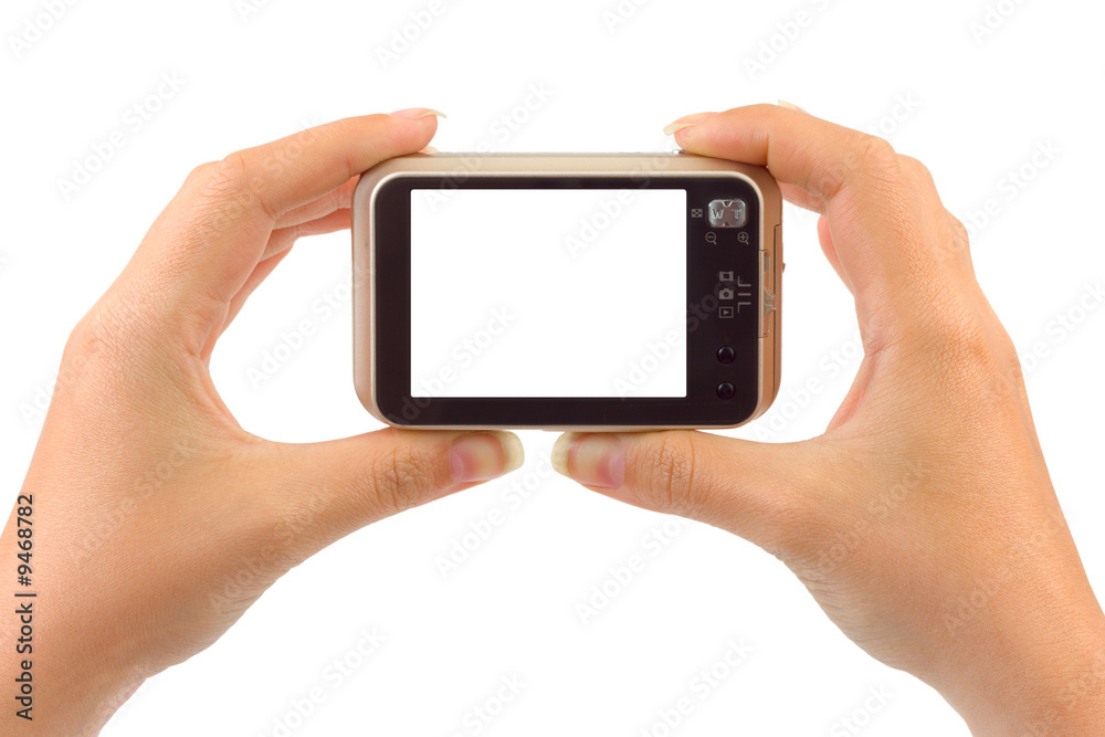 Photo camera in hands isolated on white background Photo camera in hands isolated on white background