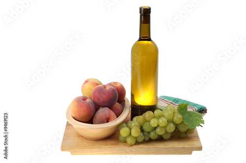 Bottle of vine and some fruits