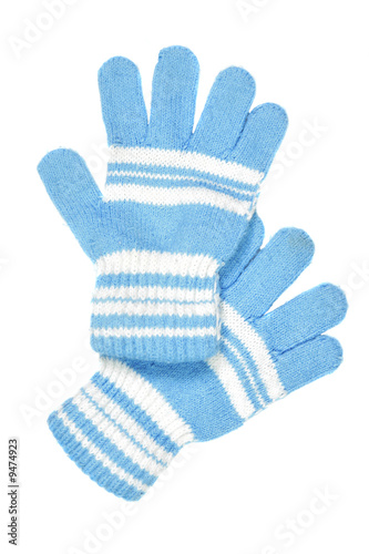 Children's wear - woollen gloves isolated over white background photo