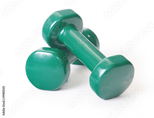 two green dumbbells isolated on white