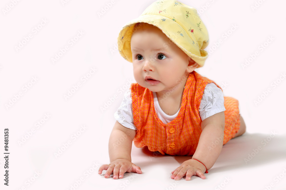 A nice baby-girl crawling on the floor A nice baby-girl crawling on the floor