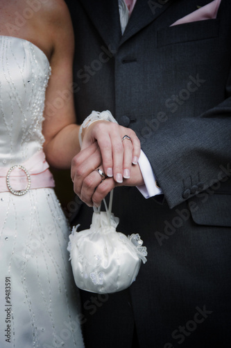Bride and Groom showing their new wedding rings