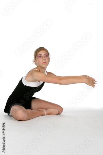 pretty young girl doing stretching exercises