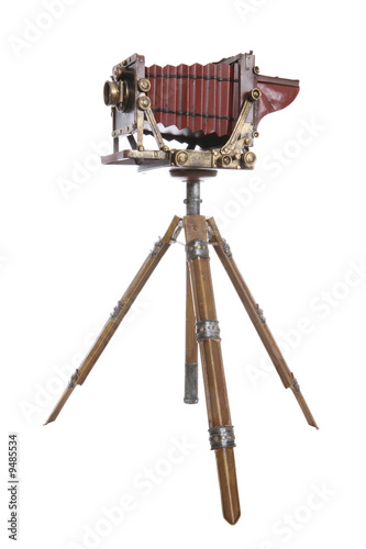 An old vintage antique professional camera isolated