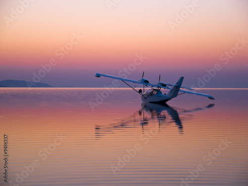 Seaplane at Sunset on lake photo