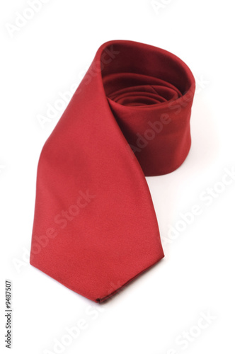 Fotografiet Red silk business tie rolled up