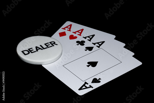 Aces and dealer mark.