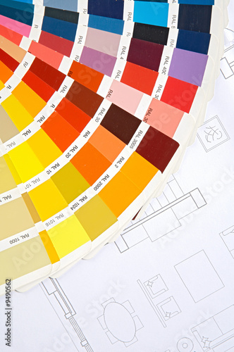 By choosing the colors of the new house on plans