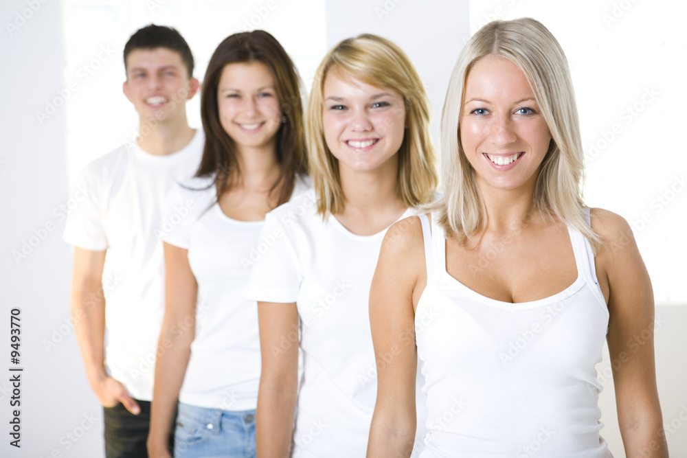 Four friends in queue Four friends in queue