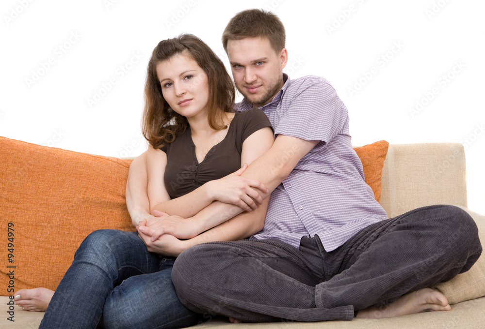 happy couple together on sofa