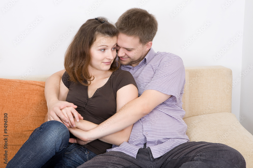 happy couple together on sofa happy couple together on sofa