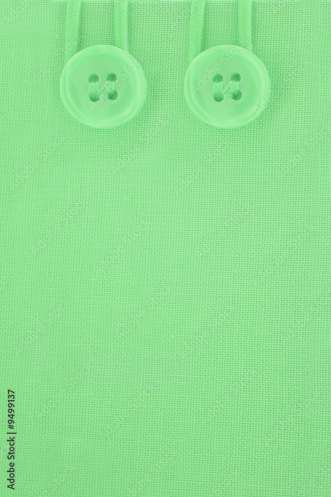 green tarp like background with buttons on top green tarp like background with buttons on top