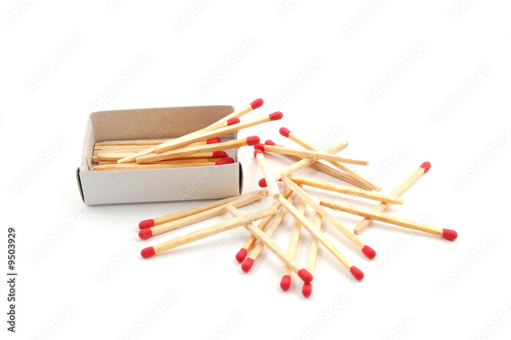 Some red matches isolated on a white background. Some red matches isolated on a white background.