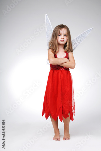 Fotografía Beautiful little girl wearing red Halloween costume.