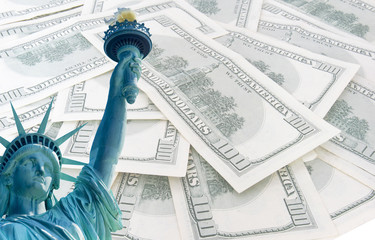 statue of liberty on 100 us dollars banknotes background