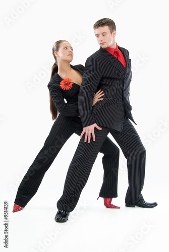 Young woman and man dancing