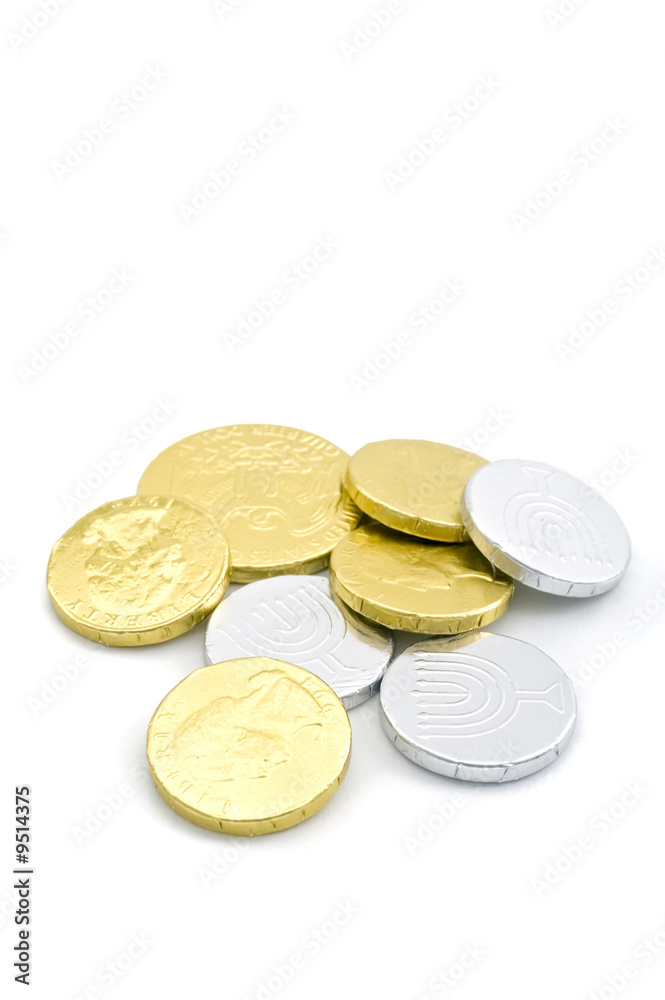 hanukkah gelt - chocolate coines isolated on white hanukkah gelt - chocolate coines isolated on white