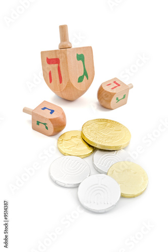 Принти на полотні three wooden dreidel and chocolate coins gelt isolated on white