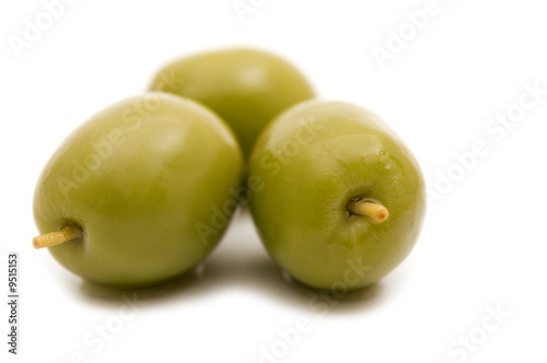 green olives on white background