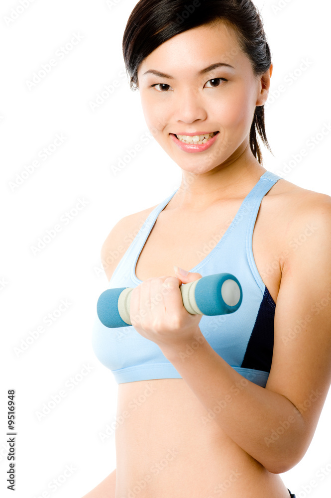 A young attractive Asian woman in sportswear with dumbbells A young attractive Asian woman in sportswear with dumbbells