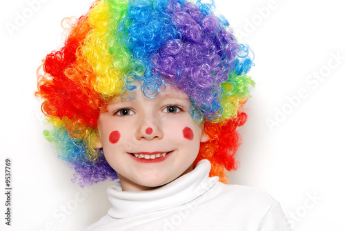 The cheerful clown on a light background