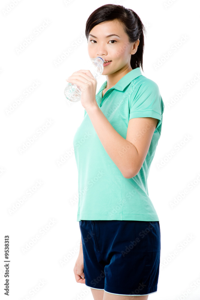 A young attractive Asian woman in sportswear with bottle A young attractive Asian woman in sportswear with bottle